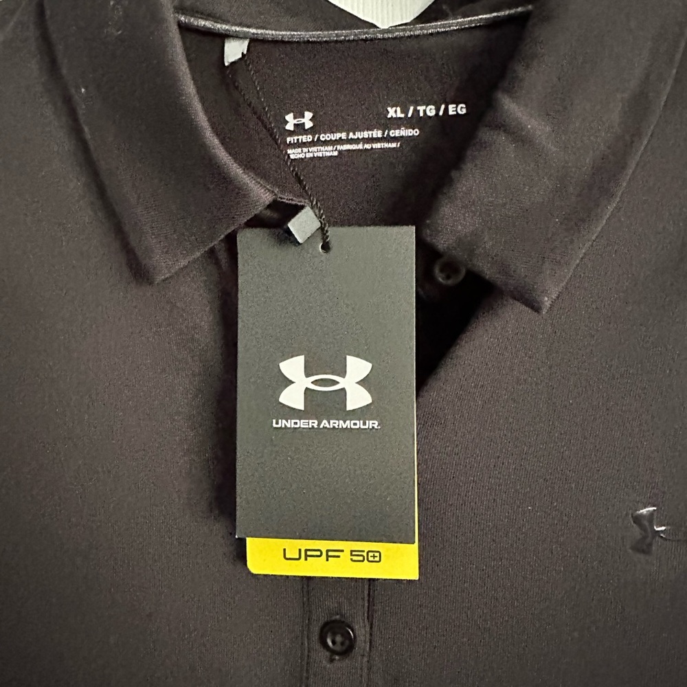 Women’s fitted Under Armour Polo size XL new with tags